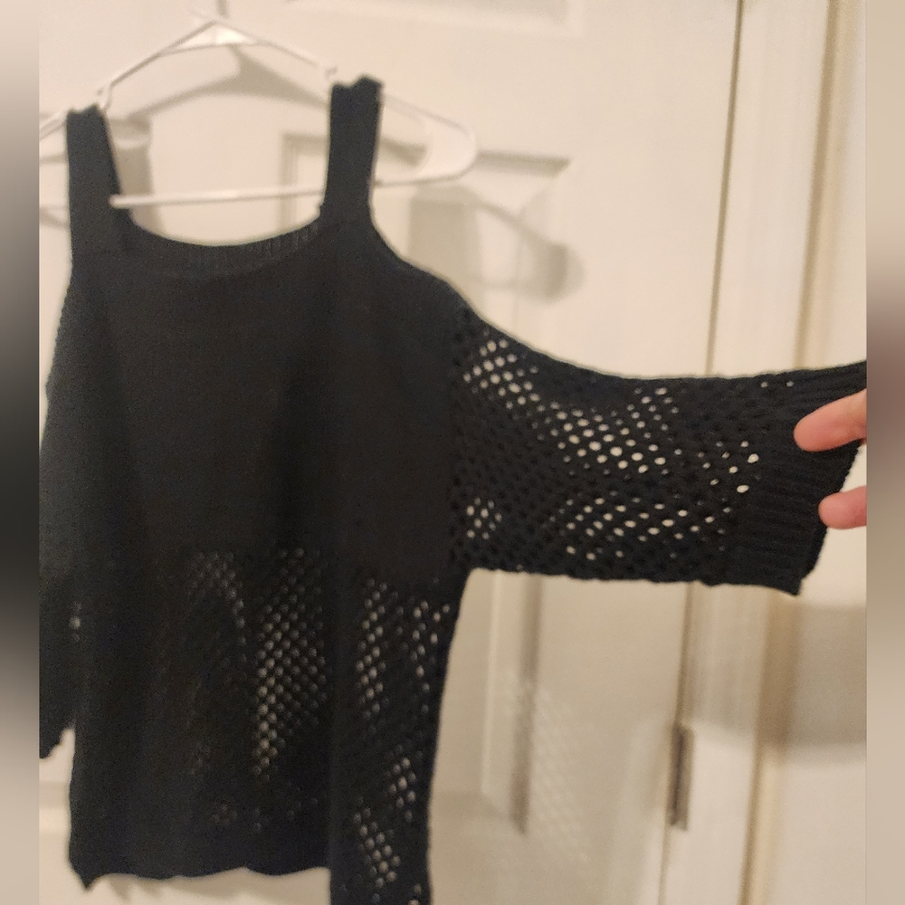 Off the shoulders sweater.